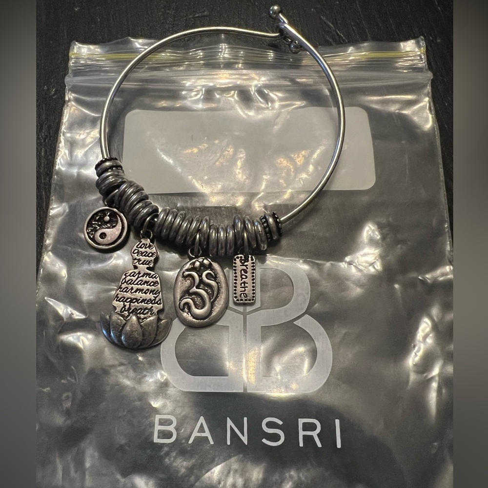 Silver Charm Bracelet with Spiritual Motifs